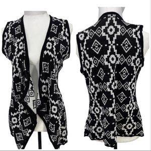Charming Charlie black and white Aztec open knit vest